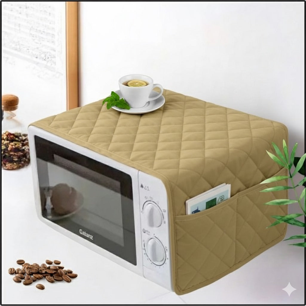 Beige quilted microwave cover with a white microwave underneath, coffee cup, and beans on a white surface.