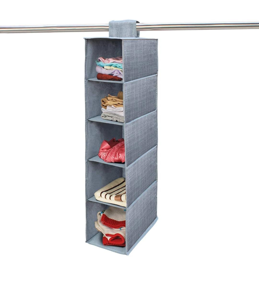 Gray hanging organizer with clothes on a white background