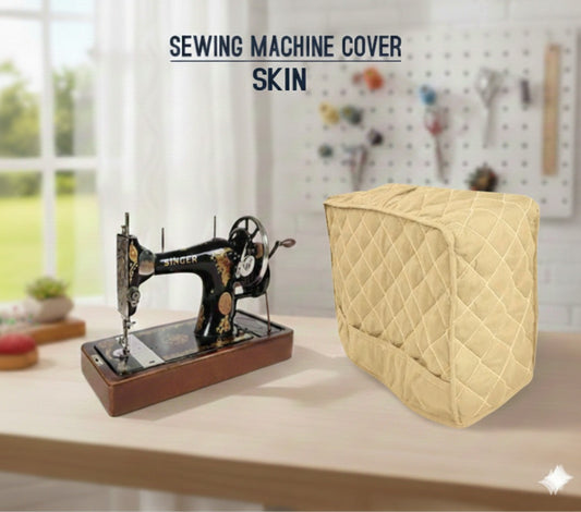 Beige sewing machine cover on a table with a vintage sewing machine in a bright room.