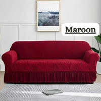Red sofa cover on a couch in a living room with 'Maroon' text overlay.