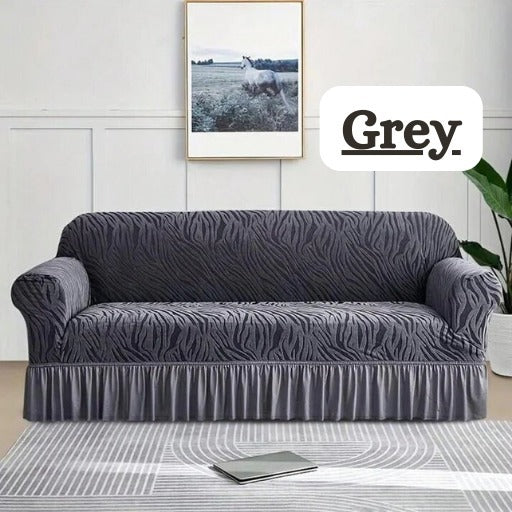 Gray sofa cover on a couch in a living room with 'Grey' text overlay