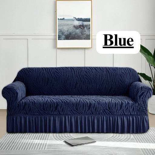 Navy blue sofa cover on a couch in a living room with a 'Blue' label.